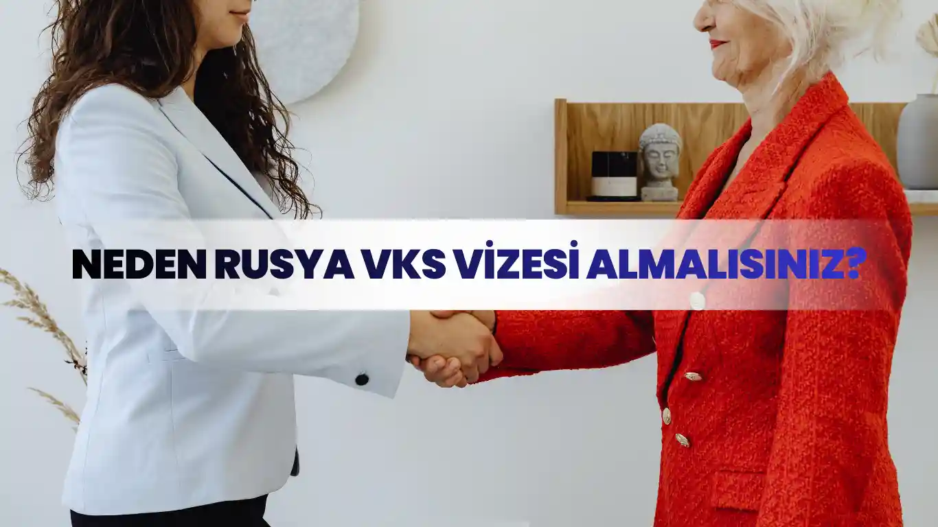 Rusya VKS vizesi kapsamında iş anlaşması yapan iki profesyonel el sıkışıyor